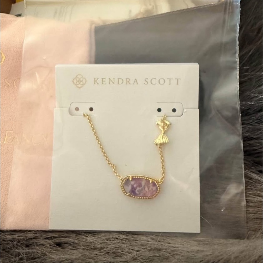 Love Shack Fancy/Kendra Scott Gold Necklace with Purple Stone.